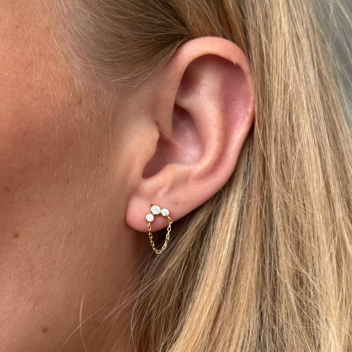 Alura Copenhagen Eclipse Single Ohrstecker – Vergoldet mit doppelter Kette & Zirkonia 