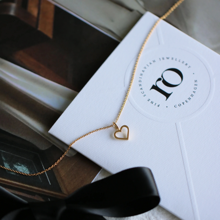 Ro Copenhagen Anhänger mit offenem Herz und Symbolen
