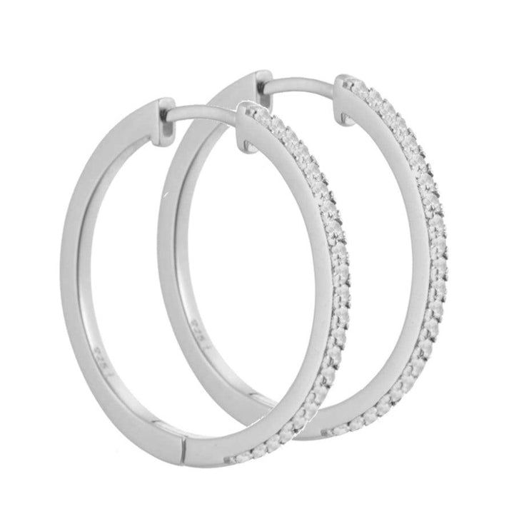 Aqua Dulce Raya Creol 925 Sterling Silber erscheint als elegante Ohrringe in Silber mit kleinen klaren Steinen. Modell 4549-4549-1