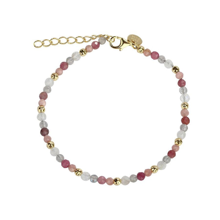 Das Aqua Dulce SUN Armband zeigt ein zartes Perlenarmband aus rosa, weißen und goldfarbenen Perlen. Modell 4556-4556-1