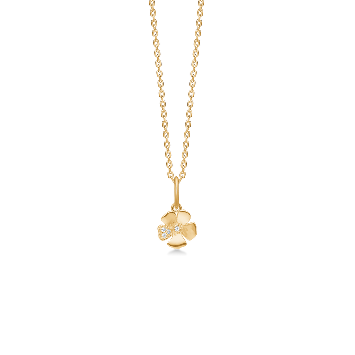 Der Mads Z Fleur-Anhänger aus 14-karätigem Gold mit 7 mm großen Diamanten ist als blütenförmiger Anhänger mit Diamanten in hellem Gold zu sehen. Modell 1531111-1