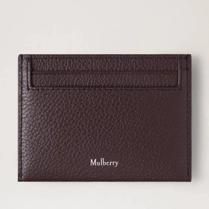 Mulberry Das Heritage Credit Card Slip Small Classic Grain Ebony verfügt über ein dunkelbraunes Kreditkartenetui aus Leder mit Logo. Modell RL4064205A110