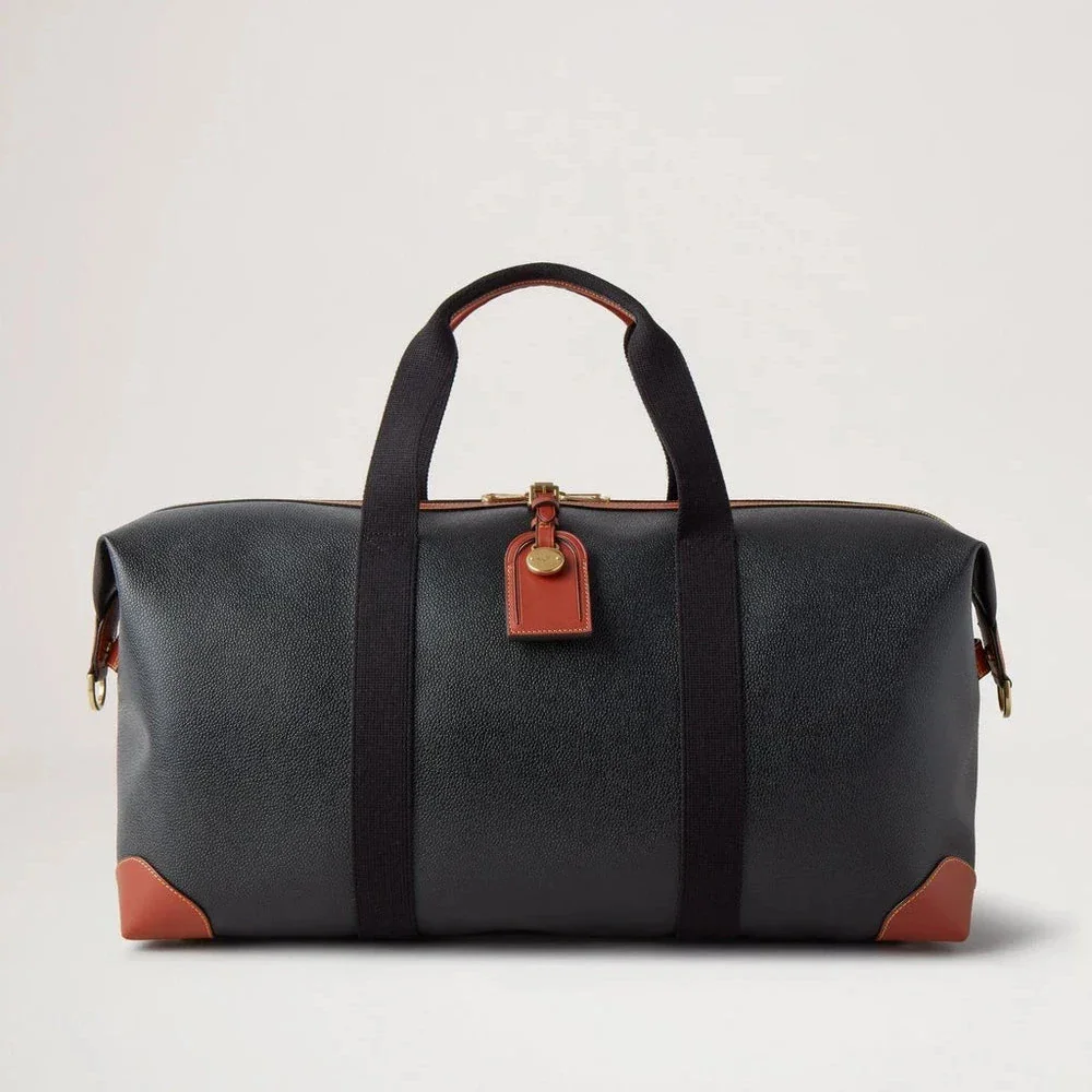 Mulberry Heritage Medium Clipper in schwarzem und cognacfarbenem Scotchgrain mit Lederdetails auf der Vorderseite. Modell HL5136127A340