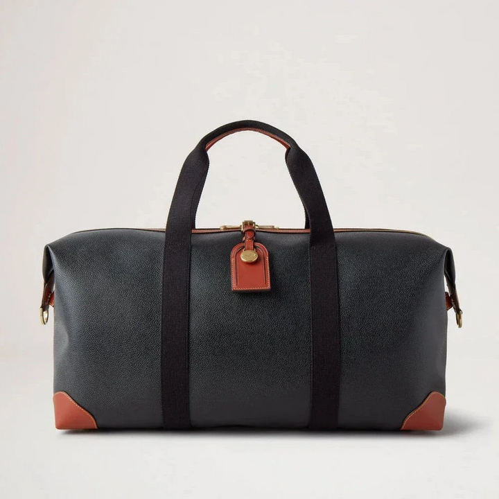 Mulberry Heritage Medium Clipper in schwarzem und cognacfarbenem Scotchgrain mit Lederdetails auf der Vorderseite. Modell HL5136127A340