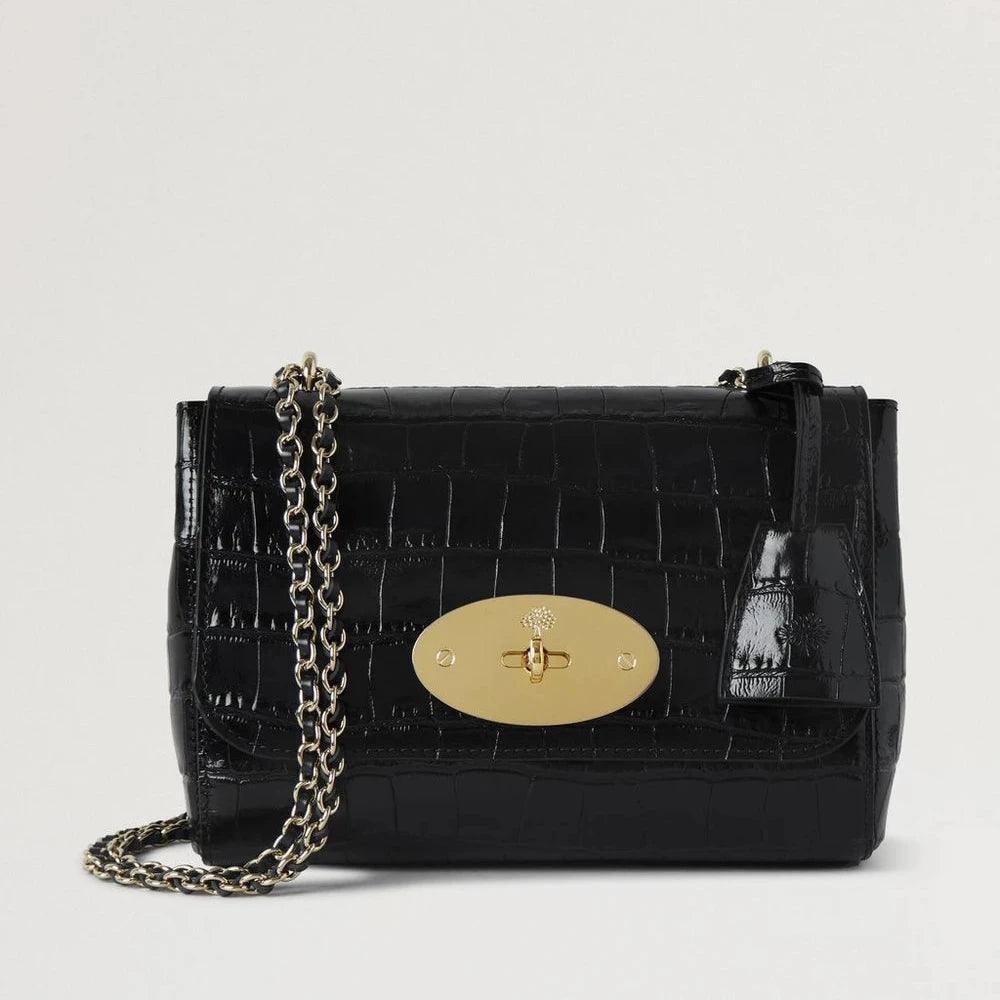 Mulberry Lily Croc Black aus schwarzem geprägtem Leder mit goldenem Kettenriemen und Verschluss. Modell HH9590641A100.
