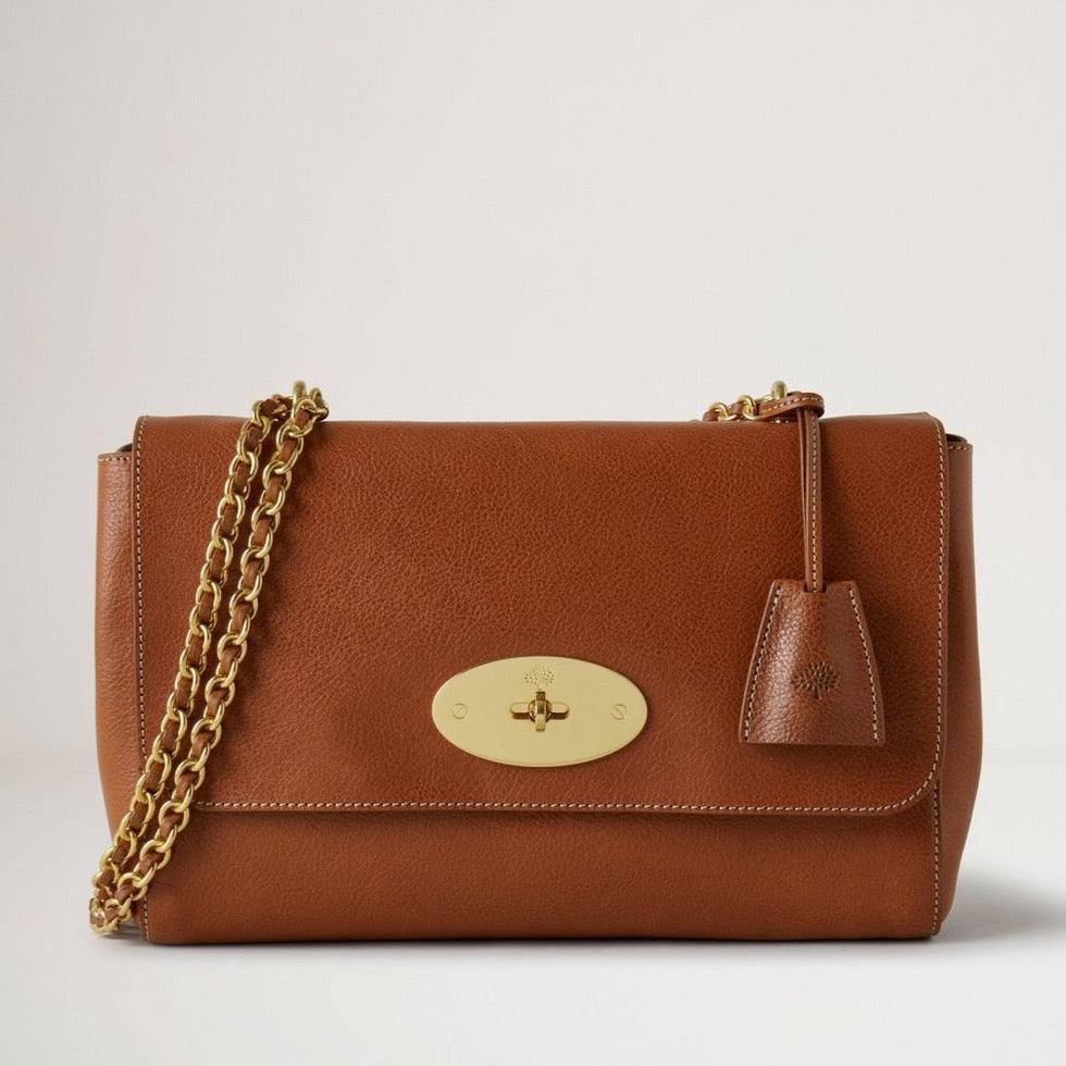 Mulberry Mittel Lily Vermächtnis NVT Oak zeigt eine mittelbraune Ledertasche mit Kettenriemen und goldfarbenem Verschluss. Modell HH7944275G110.
