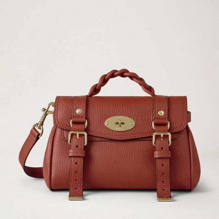 Mulberry Mini Alexa Heavy Grain Rust zeigt eine kleine Umhängetasche aus rostrotem Leder mit Flechtdetail, Modell RL6595736L190.