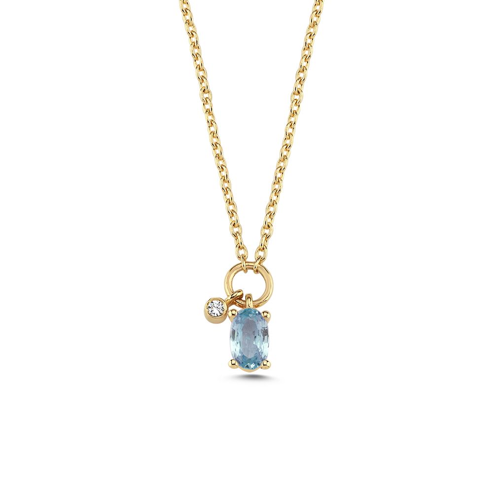 nuran-gaia-14kt-necklace-bla-sapphire-and-0-01ct-w-si-v2570sa-001rg. Elegante Halskette aus Gelbgold mit blauem Saphir und kleinem klaren Stein. Modell v2570sa-001rg