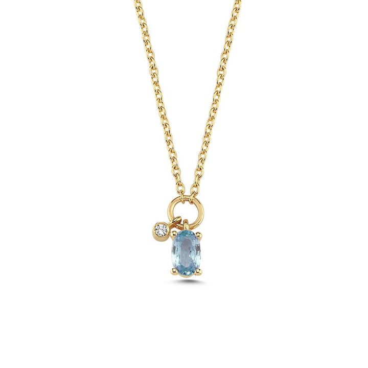 nuran-gaia-14kt-necklace-bla-sapphire-and-0-01ct-w-si-v2570sa-001rg. Elegante Halskette aus Gelbgold mit blauem Saphir und kleinem klaren Stein. Modell v2570sa-001rg