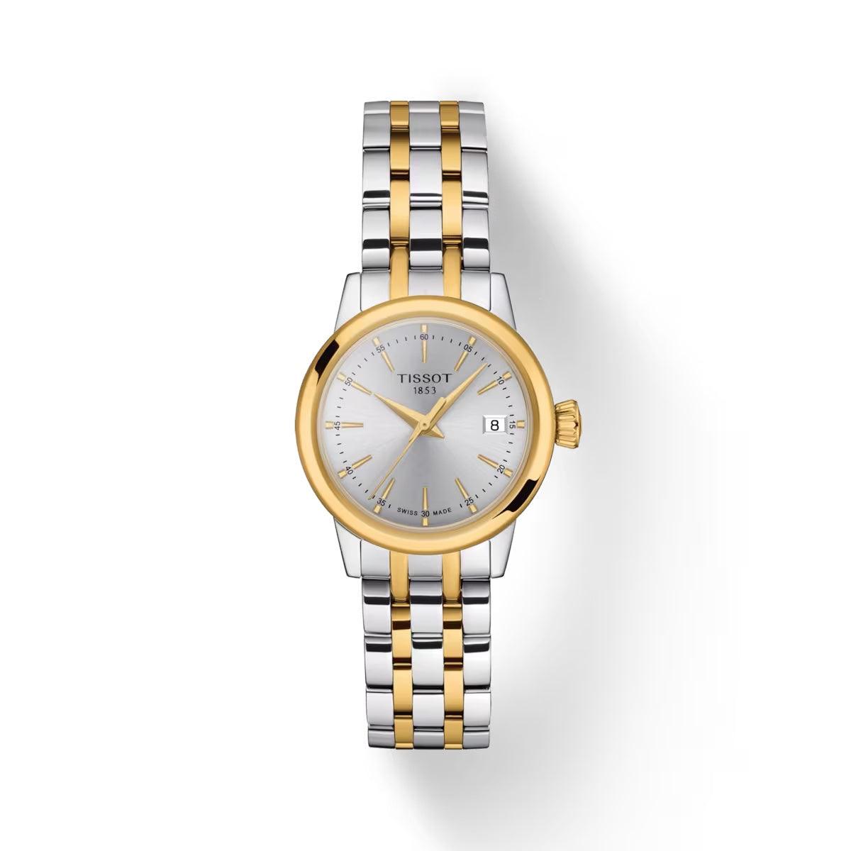 Die Tissot Classic Dream Lady Gold PVD zeigt eine elegante zweifarbige Damenuhr mit silbernem Zifferblatt und Datum. Modell T1292102203100