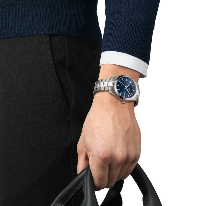 Tissot Gentleman Titanium T1274104404100 on a wrist, silver colored watch with blue dial, Model T1274104404100.