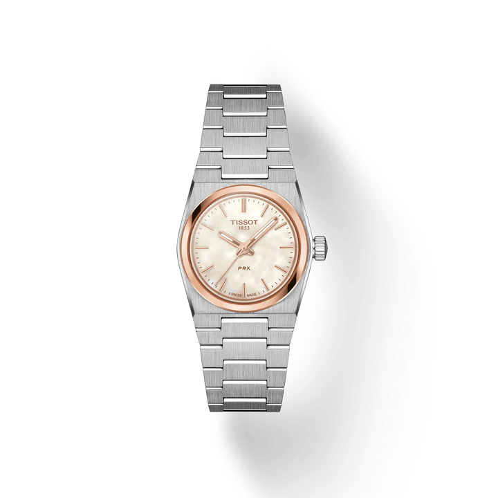 Tissot PRX Rosegold 25mm zeigt eine elegante Damenuhr aus Stahl mit roségoldener Lünette, Modell T1370102111100.