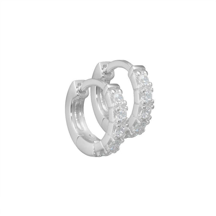 Aqua Dulce Darling Silberohrringe mit glänzenden klaren Steinen, rundes Modell. Modell 2098-2098-1