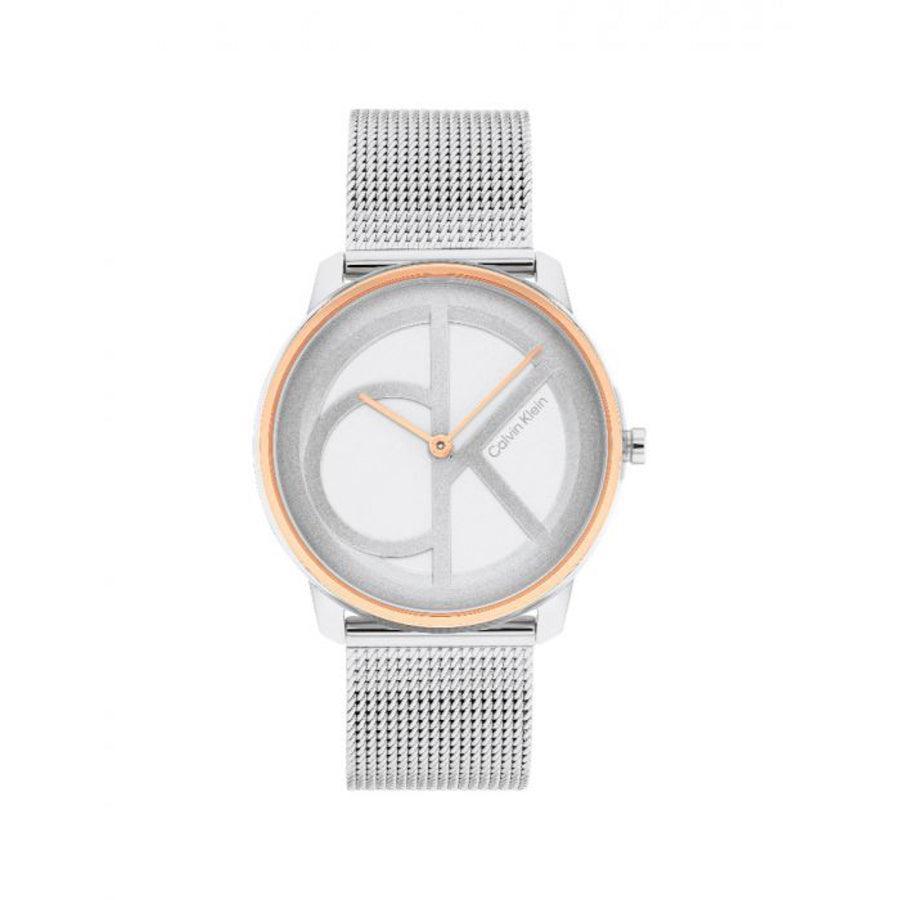 Calvin Klein Iconic Mesh Damenuhr, rundes Zifferblatt mit silbernem Mesh-Armband und goldenem Rand. Modell 25200033