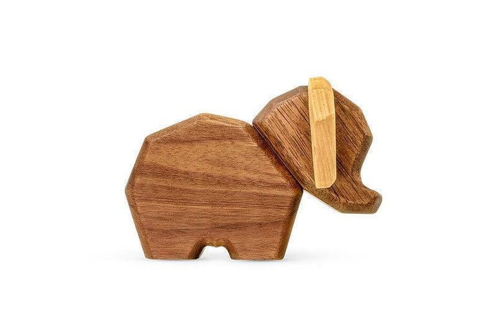 Fablewood Little Elephant zeigt eine kleine Elefantenfigur aus hellem und dunklem Holz mit drehbarem Kopf. Modell 9006-1