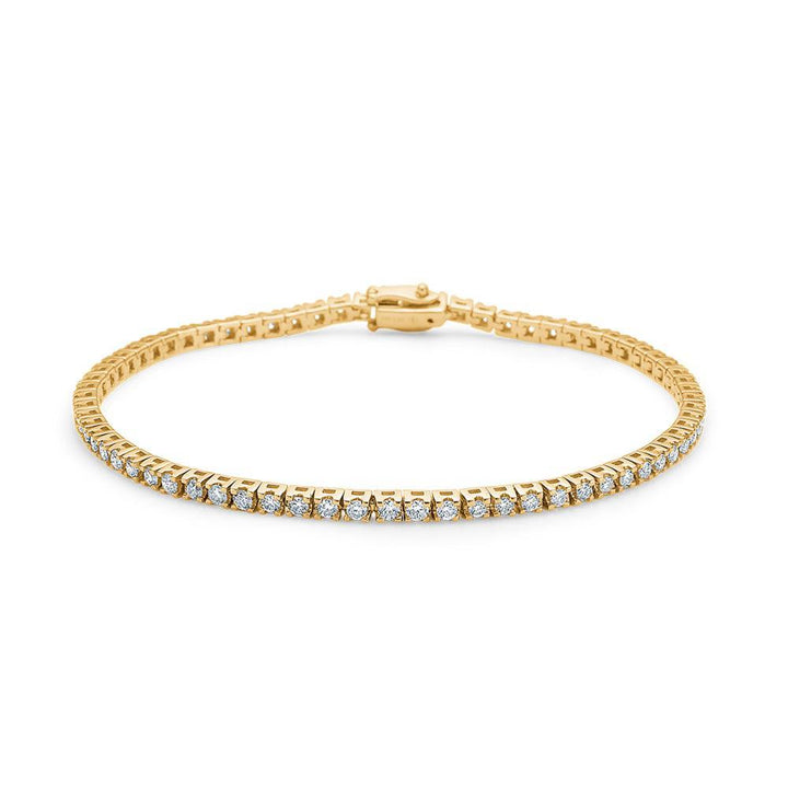 Mads Z 14kt Tennis Armband 1,53 ct W/SI zeigt ein elegantes Tennisarmband in Gold mit Diamanten. Modell 1551515-001.