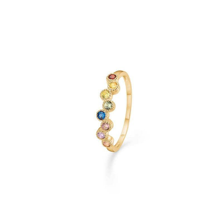 Der Mads Z 8 kt Dido Color Ring zeigt einen schlanken Goldring mit farbigen Steinen in einer Reihe, Modell 3347171-001.