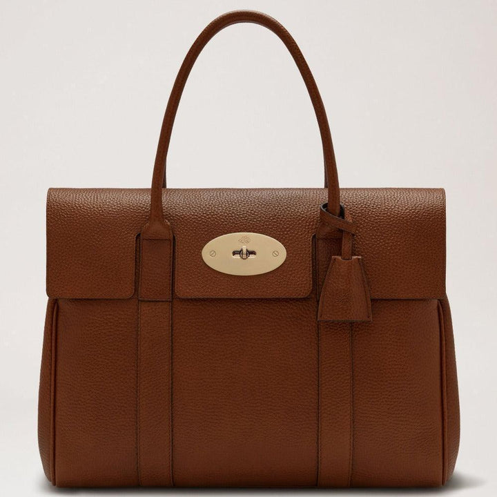 Mulberry Bayswater Kleine klassische Handtasche aus Grain Oak aus braunem Leder mit goldenen Beschlägen. Modell HH8727552G110.