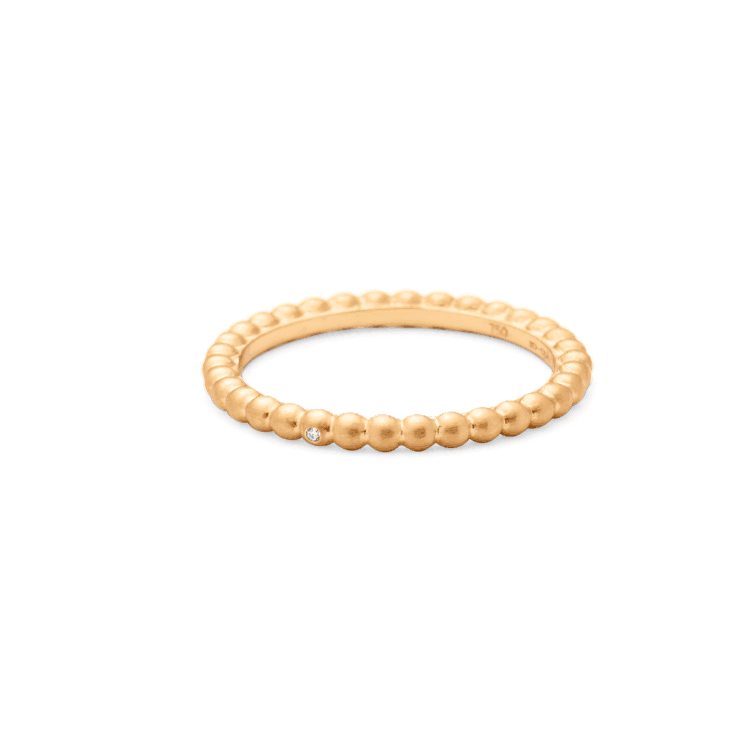 RO Copenhagen 18-karätiger Orbit Dot-Ring in gebürstetem Gold mit kleinen Kugeln und einem einzelnen Diamanten. Modell 90878-001-1